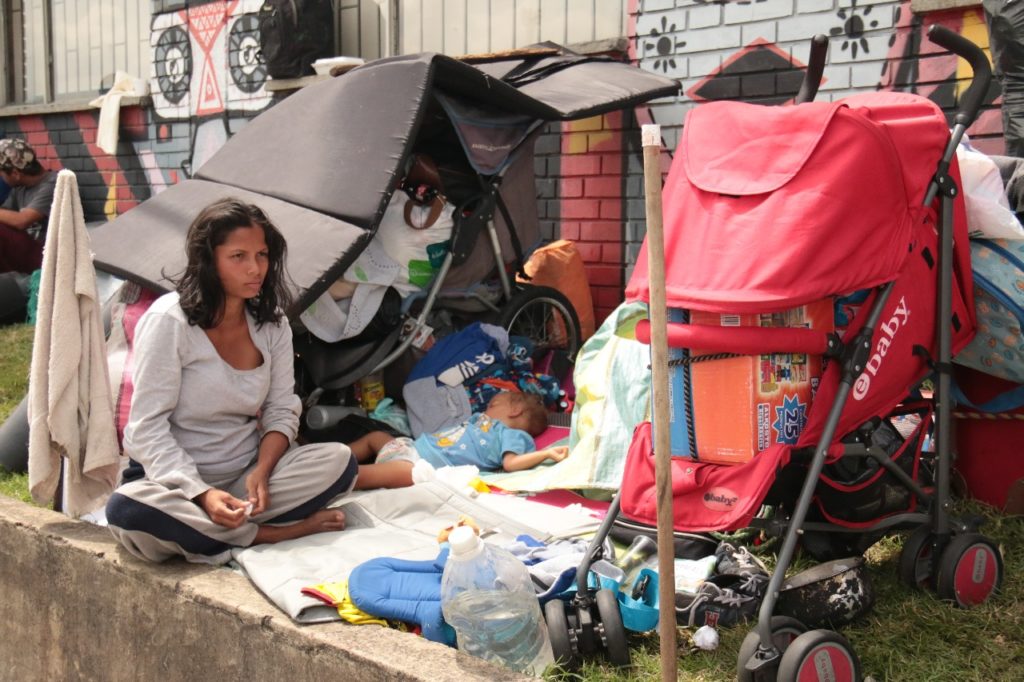 Families with young kids sleeping rough in Bogotá.