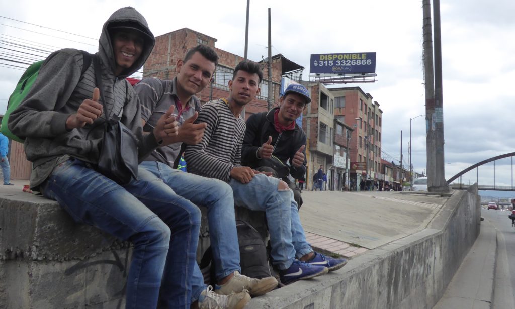 Looking for a ride out of Bogotá. These lads were stoned: many smoke marijuana to stave off hunger and cold.