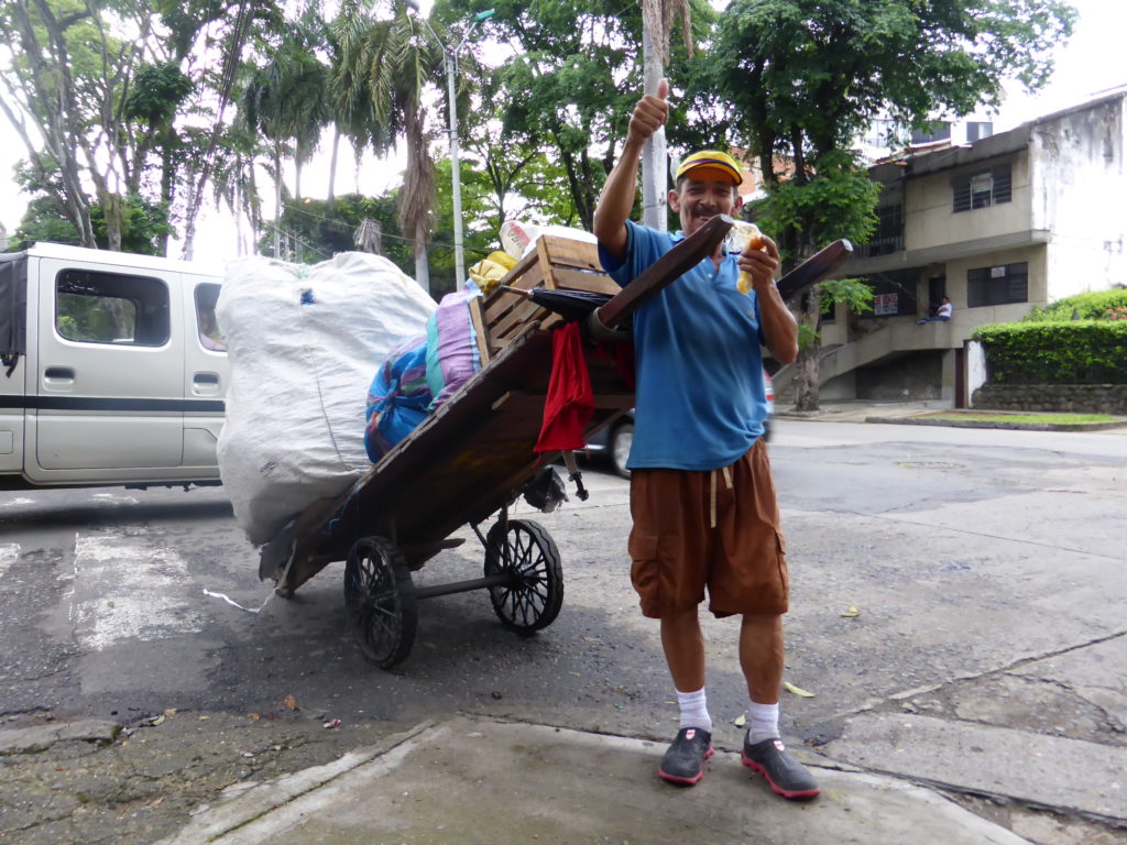 A reciclador. Collecting reusable rubbish is seen as a good job on the streets.﻿