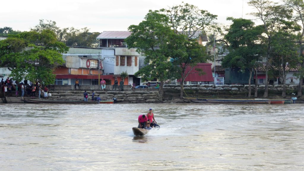 Migrants crossing the Arauca River in Arauca, an area controlled by illegal armed groups.