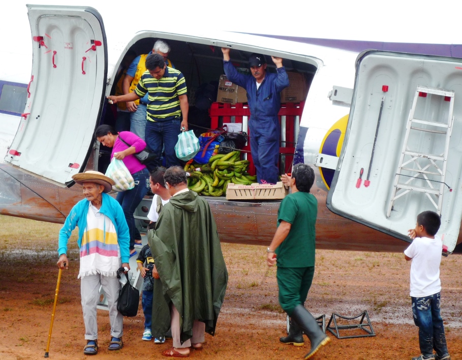 DC-3 planes are a lifeline for remote communities. Here unloading in San Felipe, Guainia, Colombia.