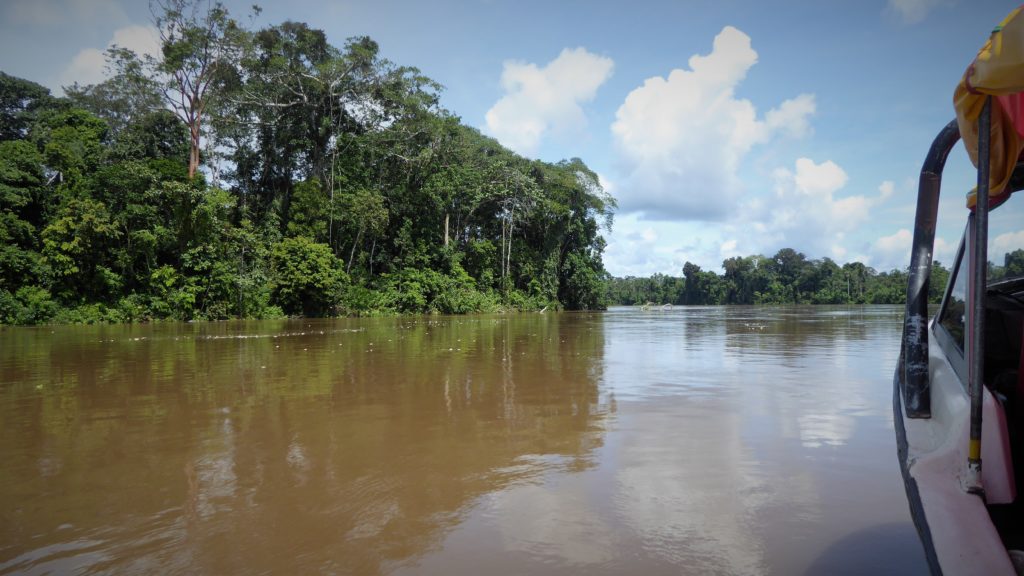 Colombian Amazon El Encanto: Heading down river. The Rio Putumayo has a reputation for smuggling and drug-running, and armed groups are present here