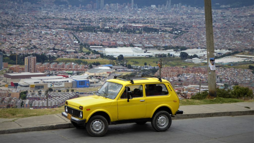 Lada Nivas are also common here,  excellent and efficient 4x4s. This one in Ciudada Bolivart, looking over Bogotá.