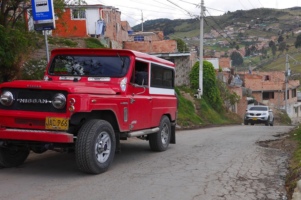 Old 4x4s take passengers to the higher barrios, here a Nissan Patrol 60 series
