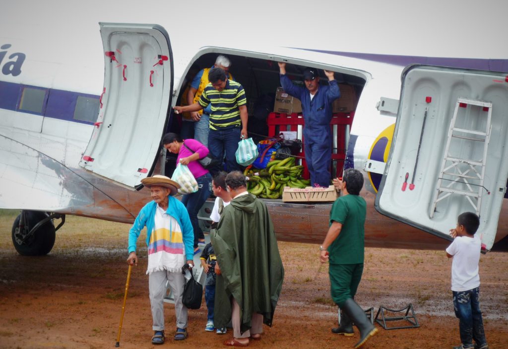 Unloading in San Felipe. These carguero DC-3 flights are a lifeline of goods and people to muddy jungle airstrips, often to places where there is no other transport apart from weeks-long river trips.