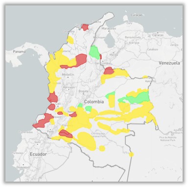 Disputed zones of Colombia, in red, and areas dominated by just one armed group, yellow.