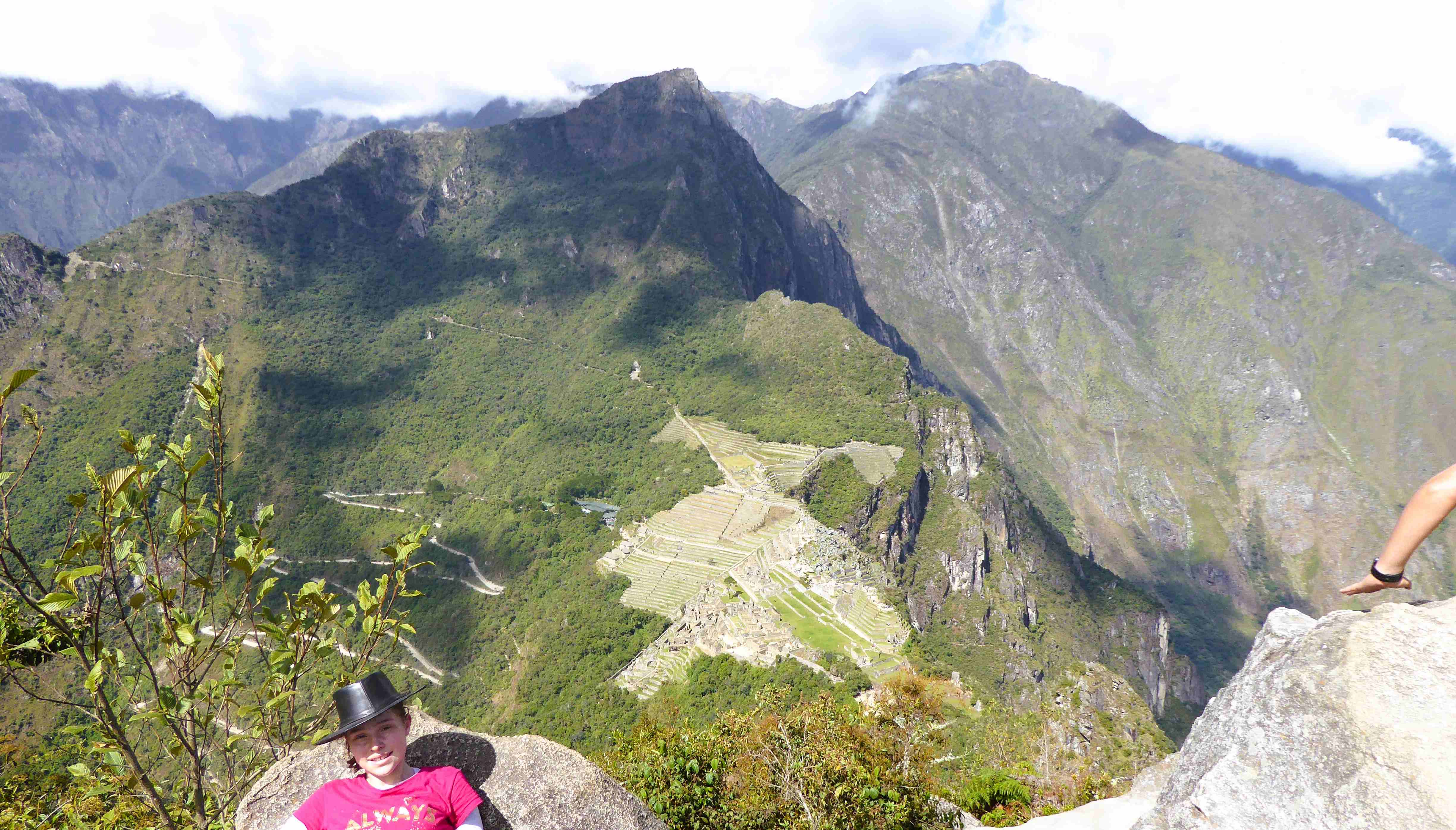 The view from Wayna Picchu, looking down on Machu Picchu ruins. The zig zag road behind is the rip-off (US$32) bus route to Aguas Calientes. You can walk up in 60 minutes if you are fit and don't mind steep climb.