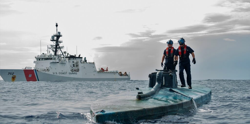 A Coast Guard Cutter Stratton boarding team investigates a self-propelled semi-submersible interdicted in international waters off the coast of Central America, July 19, 2015. The Stratton’s crew recovered more than 6 tons of cocaine from the 40-foot vessel